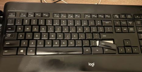 My broken keyboard. The Shift key broke off while writing this novel in 10 days.